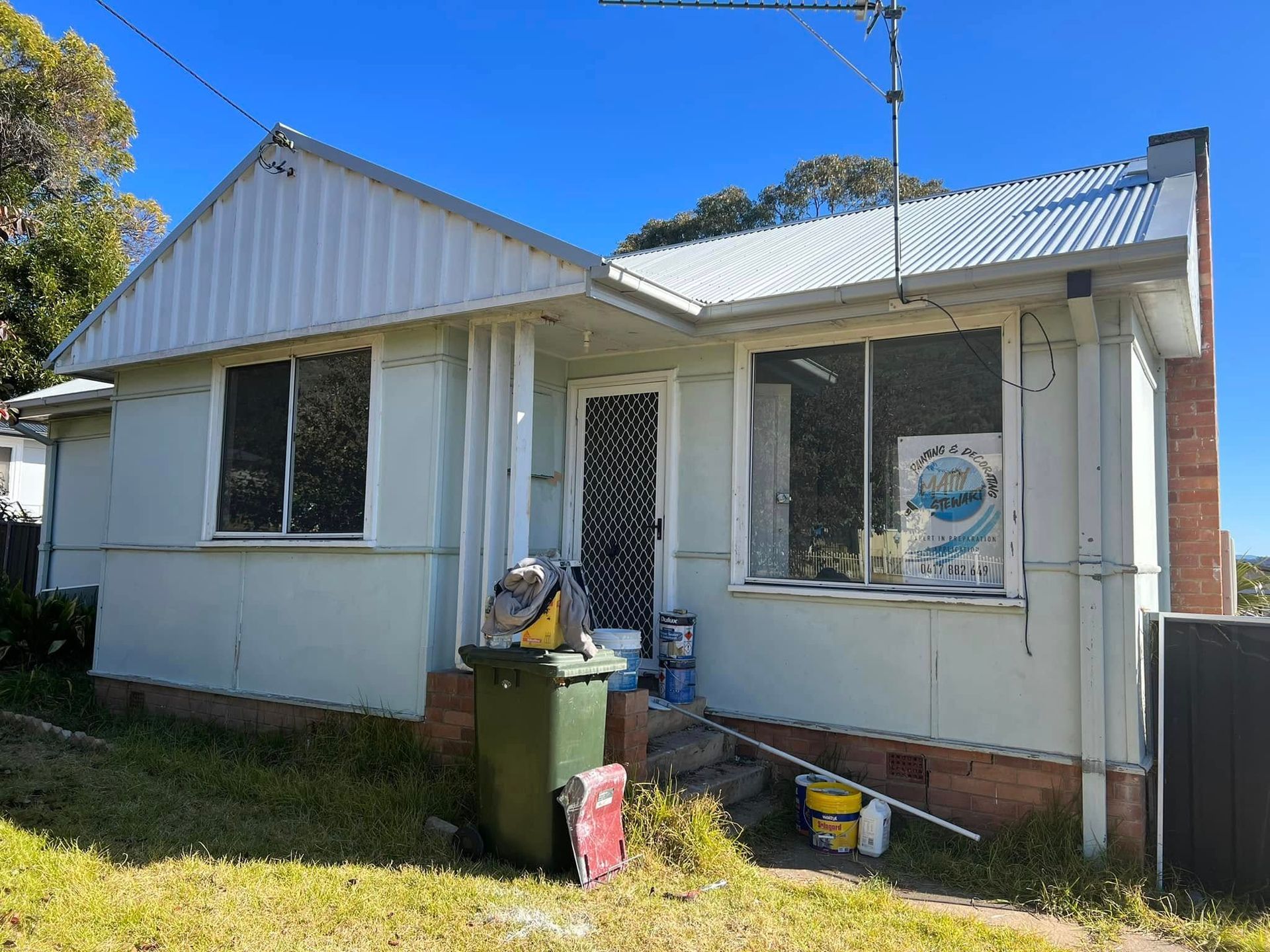 Small White House Exterior with A Metal Roof — Matty Stewart Painting & Decorating in Mudgee, NSW