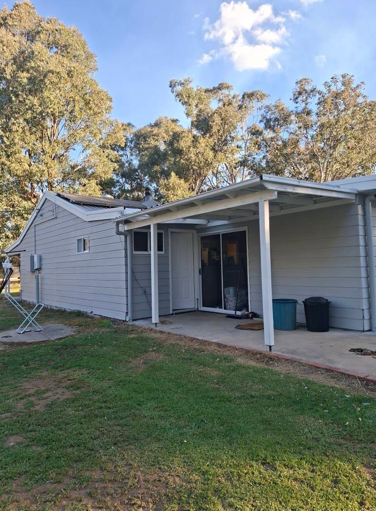Backyard View of A White House with A Covered Patio — Matty Stewart Painting & Decorating in Mudgee, NSW