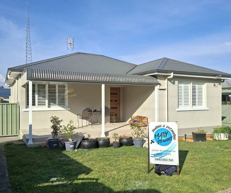 Single Story House with Front Porch and A Sign in The Yard — Matty Stewart Painting & Decorating in Mudgee, NSW