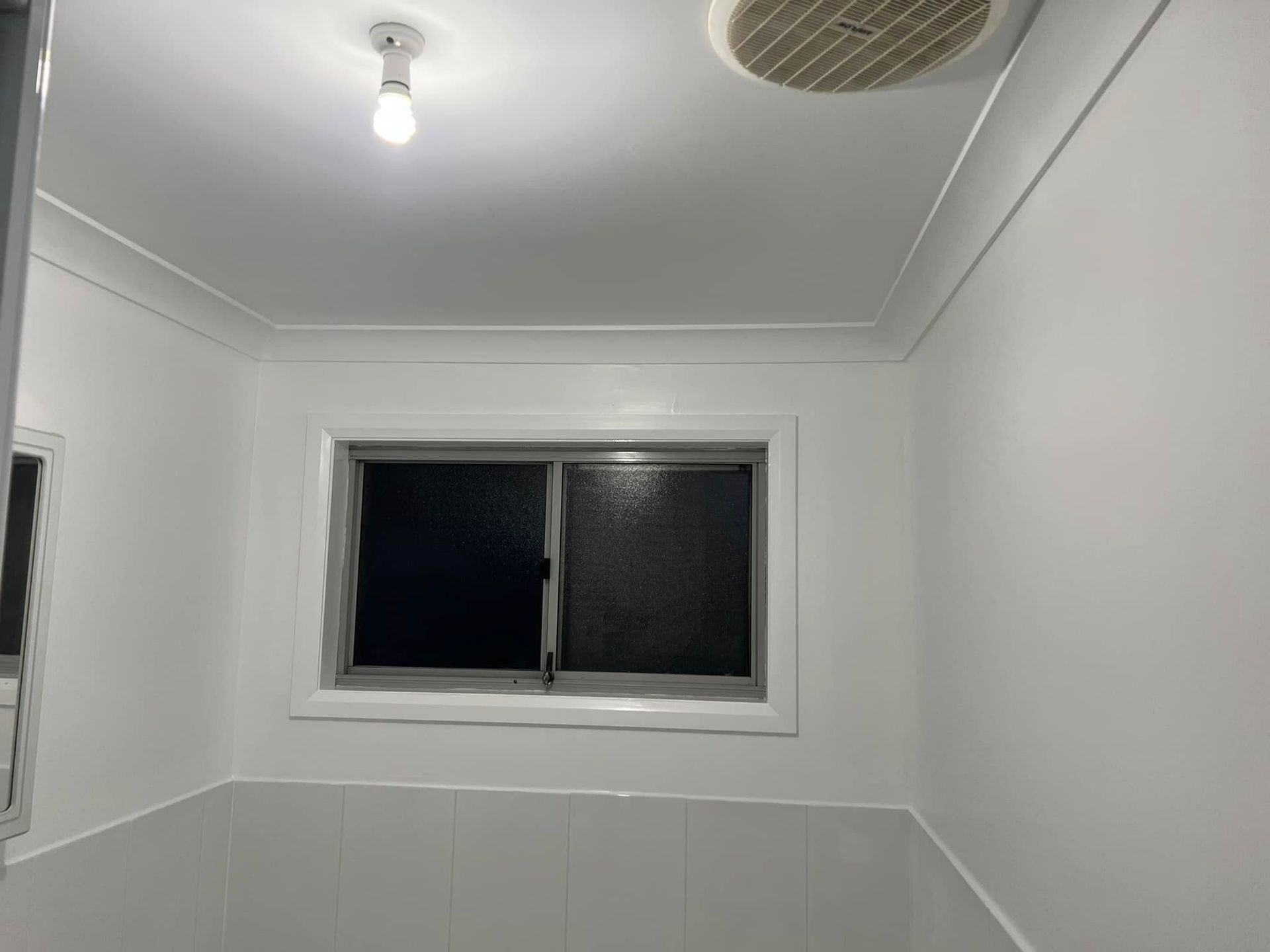 Small White Bathroom with A Window — Matty Stewart Painting & Decorating in Mudgee, NSW