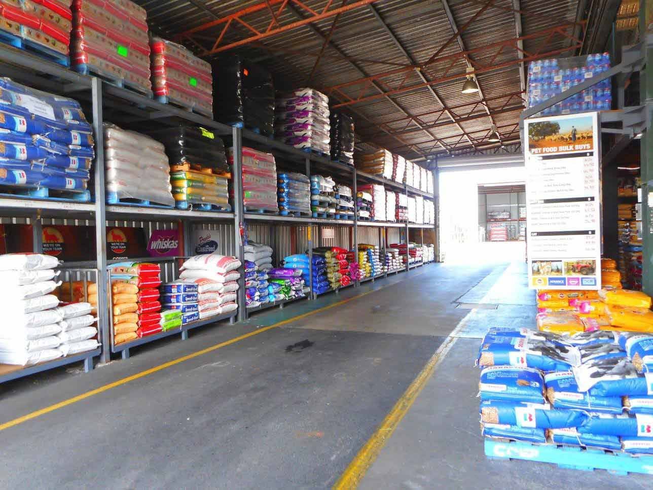 A Warehouse Filled With Lots Of Bags Agricultural Supplies — TGT Pty Ltd in Mareeba, QLD