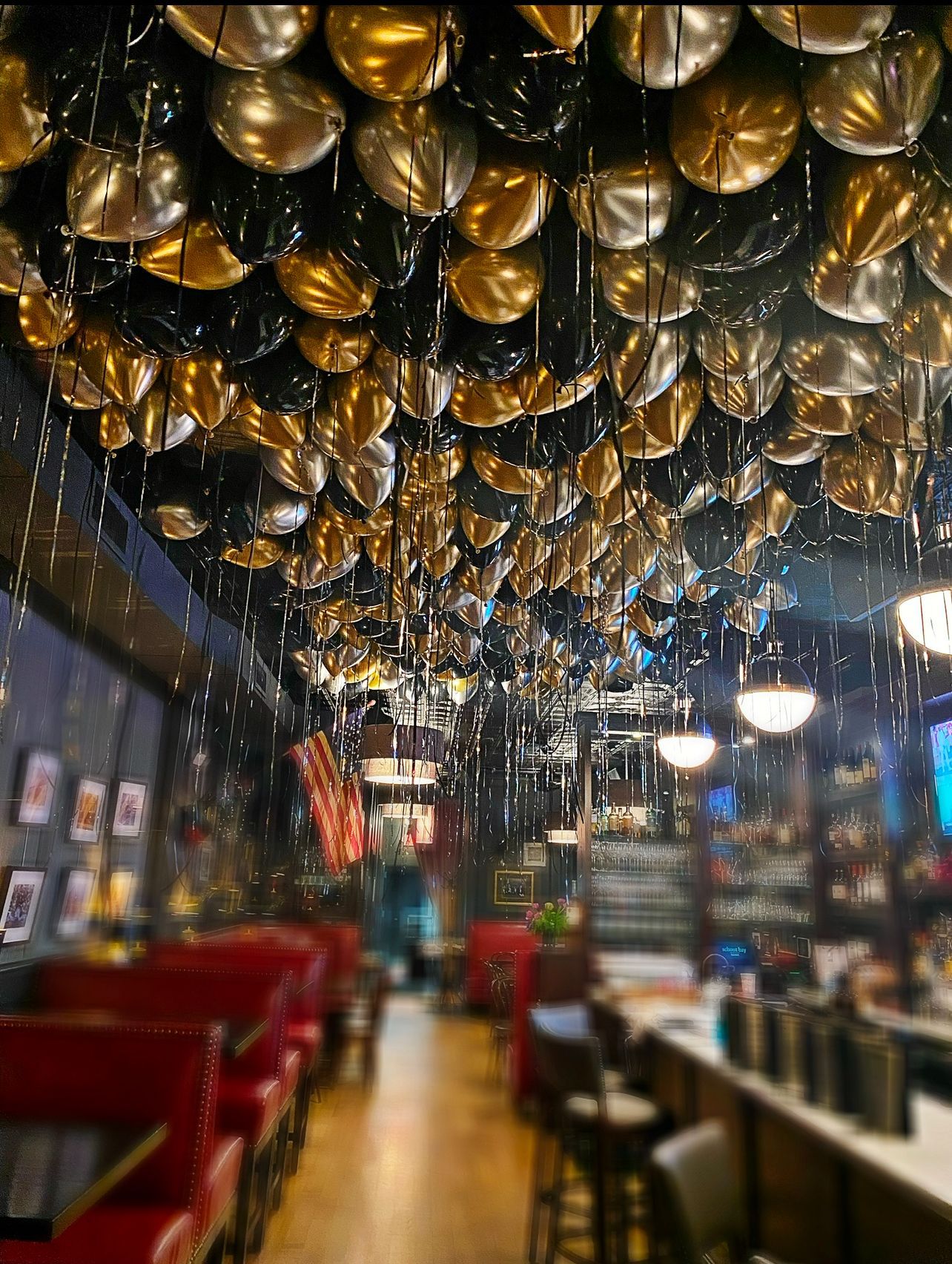 black and gold balloon hanging from the ceiling