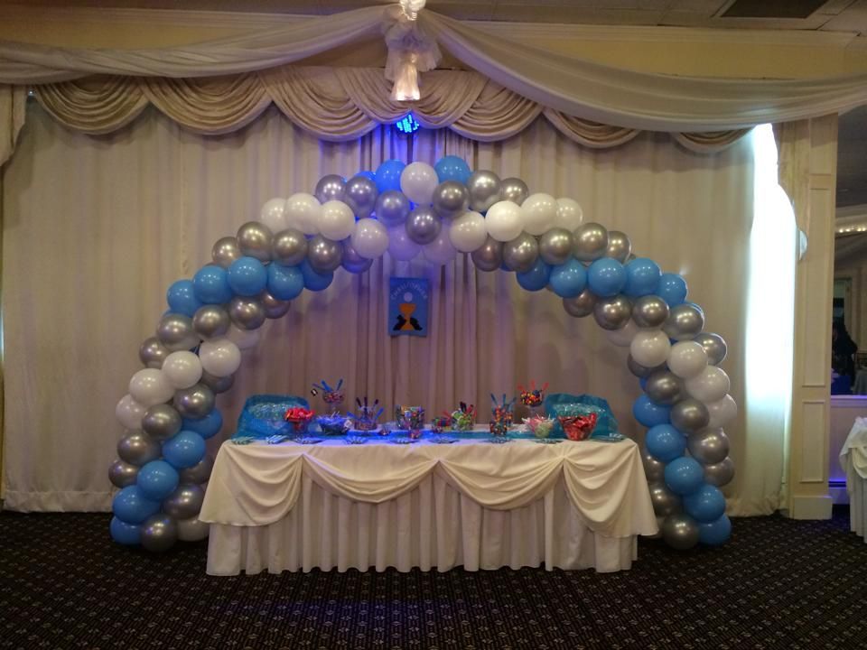 A popcorn box made out of balloons in a hallway