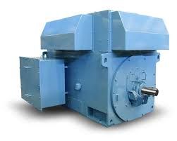A blue electric motor is sitting on a white surface.