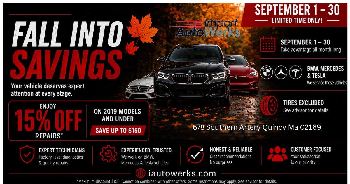 AutoWerks logo over black SUV by Autumn colored trees and leaves on the road