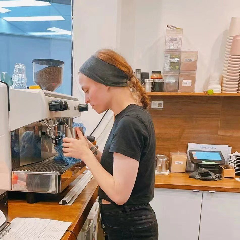 Woman Making a Coffee — Hobart, TAS — South On Collins