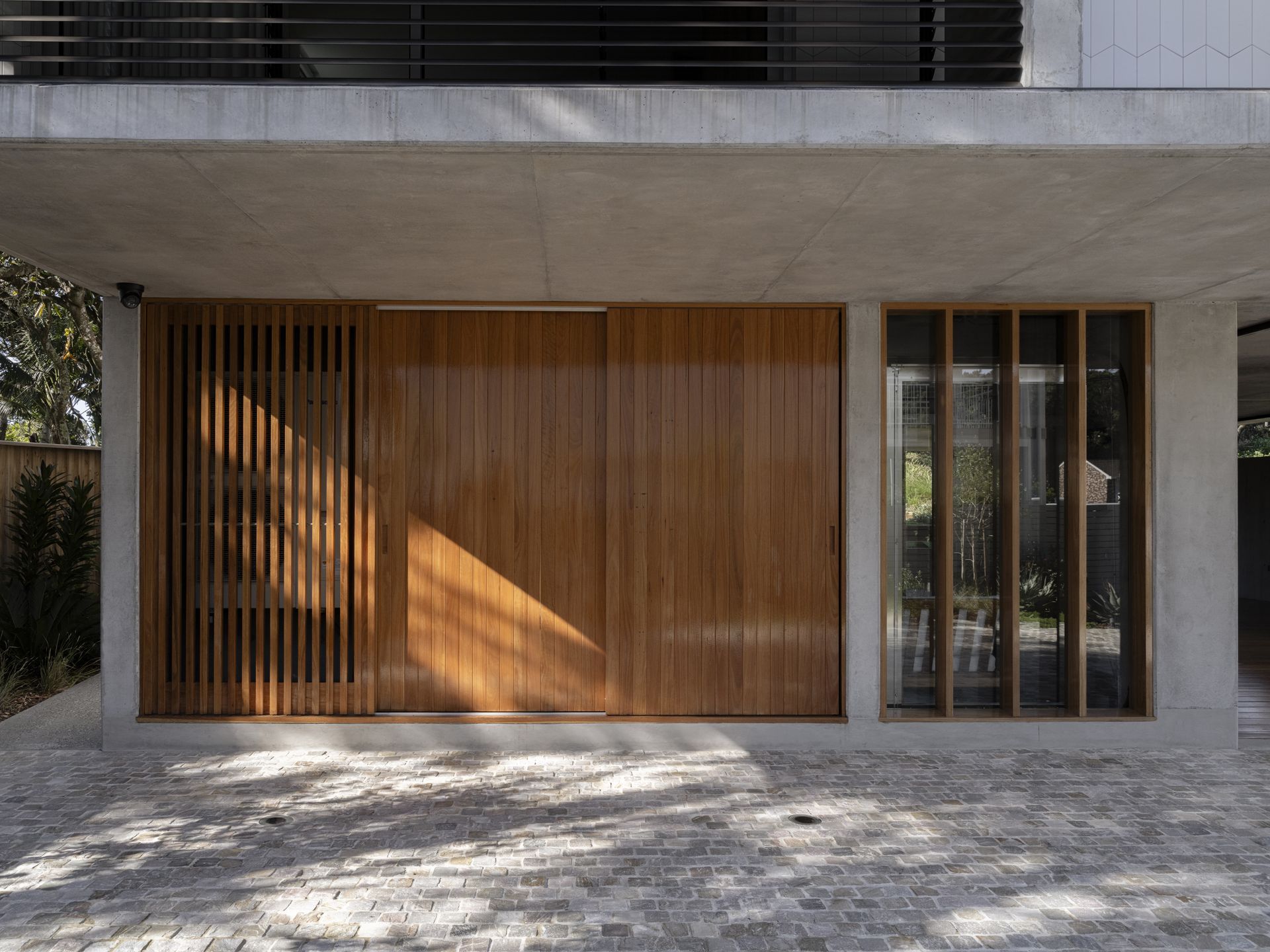 Modern House Facade With Wood Slat and Sliding Panels — Fineworx Joinery in Warnervale, NSW