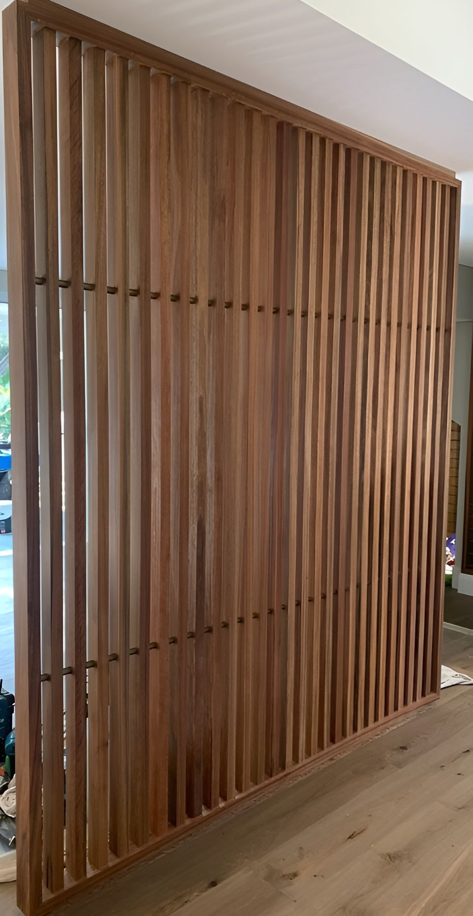 Wooden Slatted Room Divider with Vertical Panels in A Modern Interior — Fineworx Joinery in Nambucca Heads, NSW