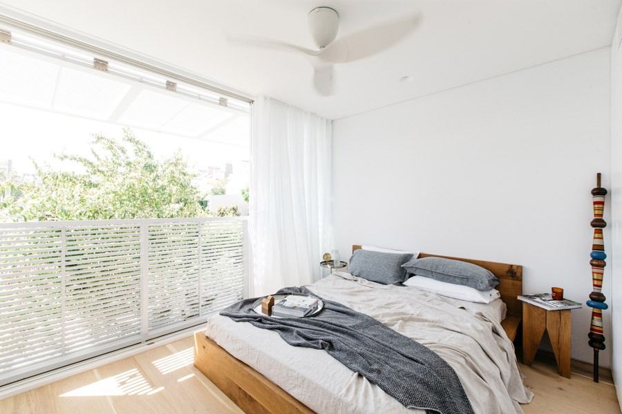 Bright Bedroom with Large Window with Sheer Curtains — Fineworx Joinery in Warnervale, NSW