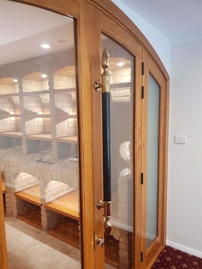 Wooden Sauna Room Door with Glass Panels — Fineworx Joinery in Warnervale, NSW