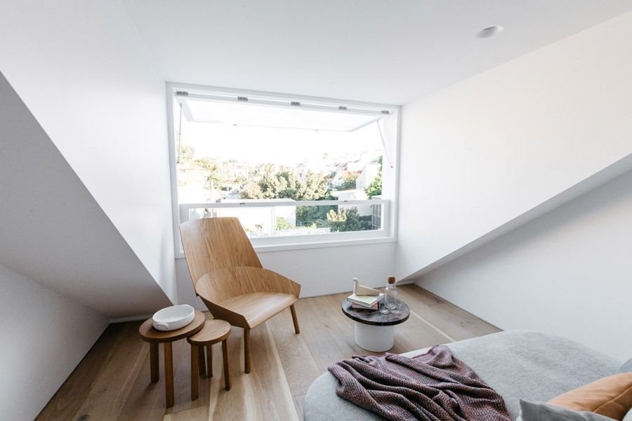 Minimal Attic Bedroom with Slanted White Walls — Fineworx Joinery in Warnervale, NSW