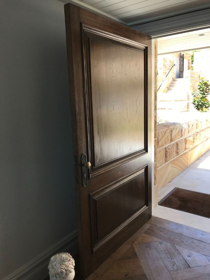 Open Front Door with Sunlight Spilling Into a Hallway — Fineworx Joinery in Warnervale, NSW