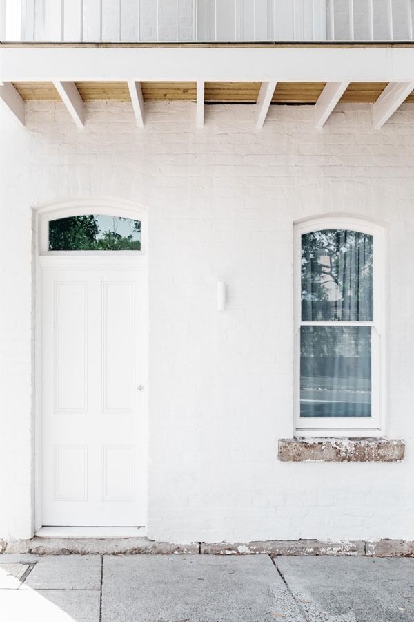White Exterior Wall with A Door and Window Under a Covered Porch — Fineworx Joinery in Warnervale, NSW