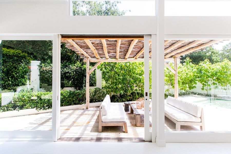 Bright Modern Patio with White Lounge Chairs — Fineworx Joinery in Warnervale, NSW