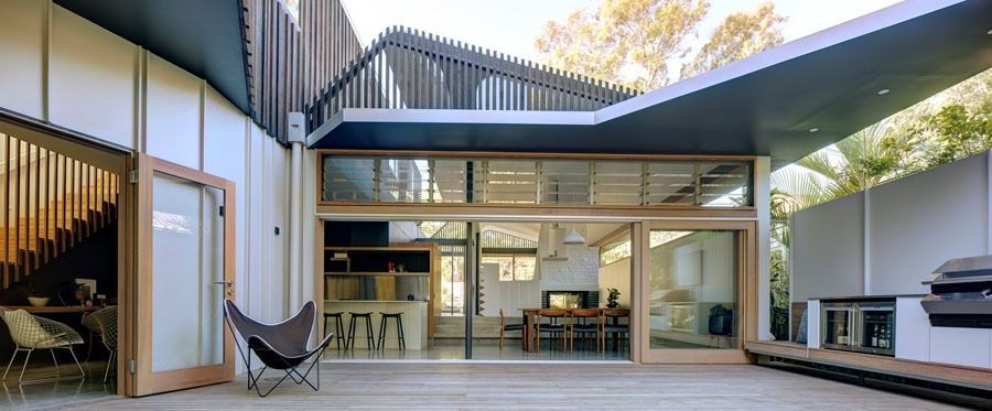 Modern House Patio with Glass Doors and Outdoor Seating Area — Fineworx Joinery in Warnervale, NSW