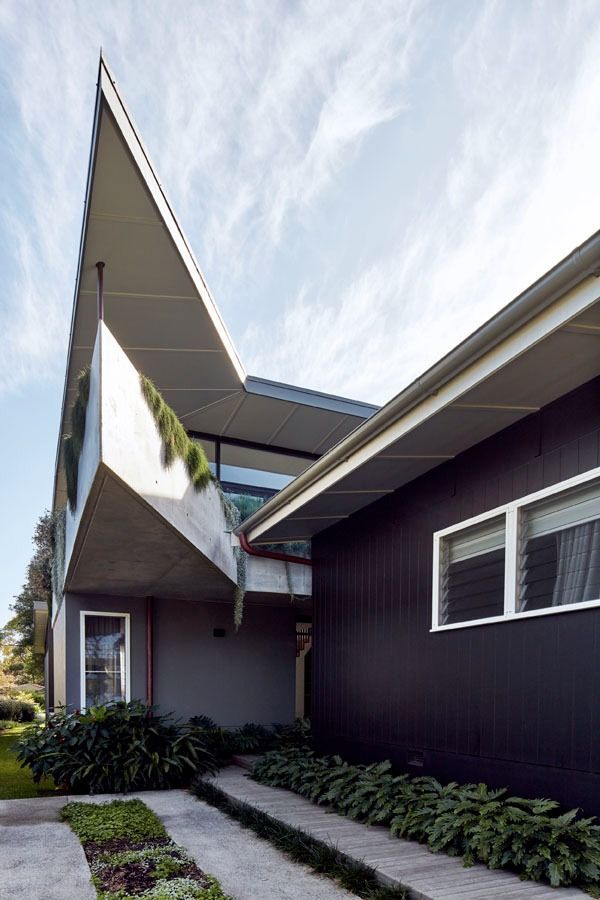 Modern House with Angular Roof and A Narrow Garden Path by The Entrance — Fineworx Joinery in Warnervale, NSW