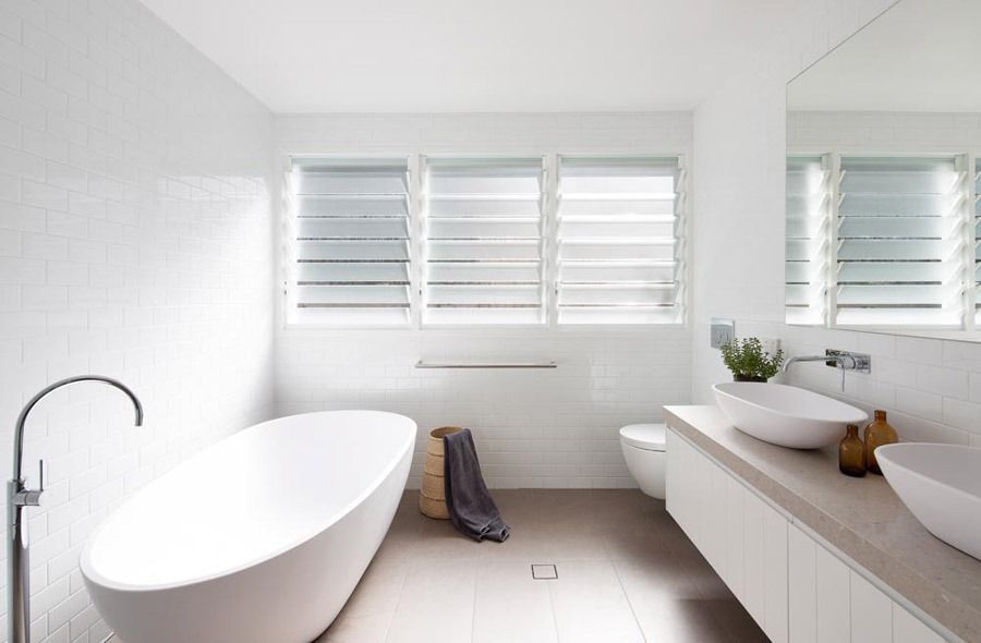 Bright Minimalist Bathroom with A Freestanding Tub — Fineworx Joinery in Warnervale, NSW