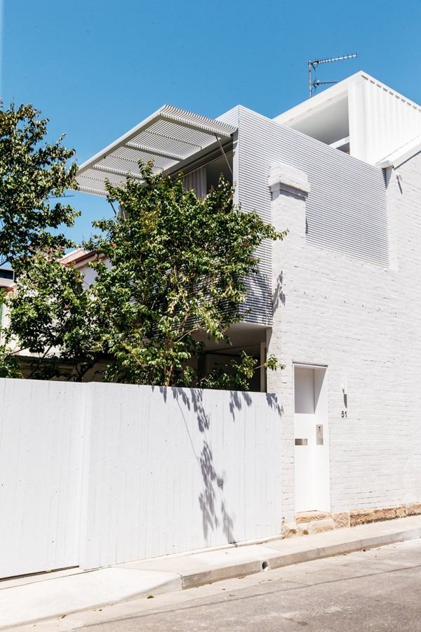 White Modern House with A Balcony and White Fence — Fineworx Joinery in Warnervale, NSW