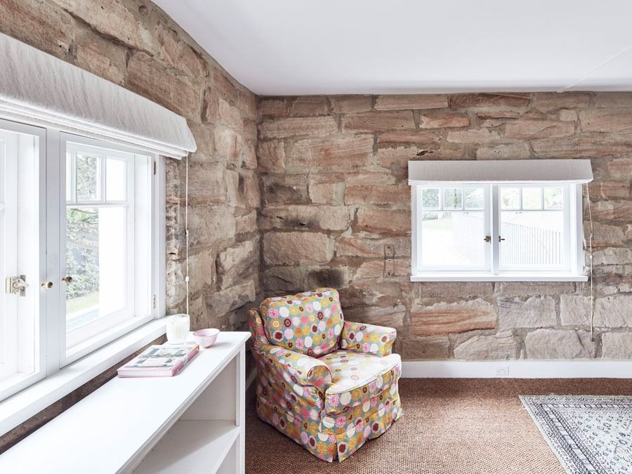 Cozy Room with White Windows and A Patterned Rug Near a Bright Window — Fineworx Joinery in Warnervale, NSW
