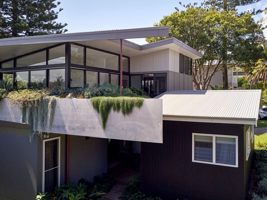 Modern House with Angular Roof and Large Windows — Fineworx Joinery in Warnervale, NSW
