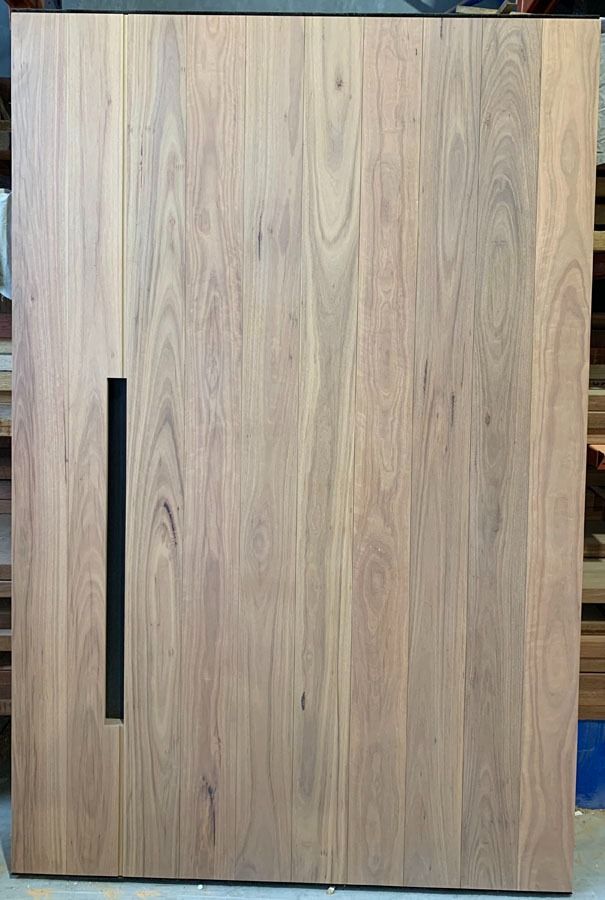 Light Wood Cabinet with A Vertical Black Handle on The Left Side — Fineworx Joinery in Warnervale, NSW