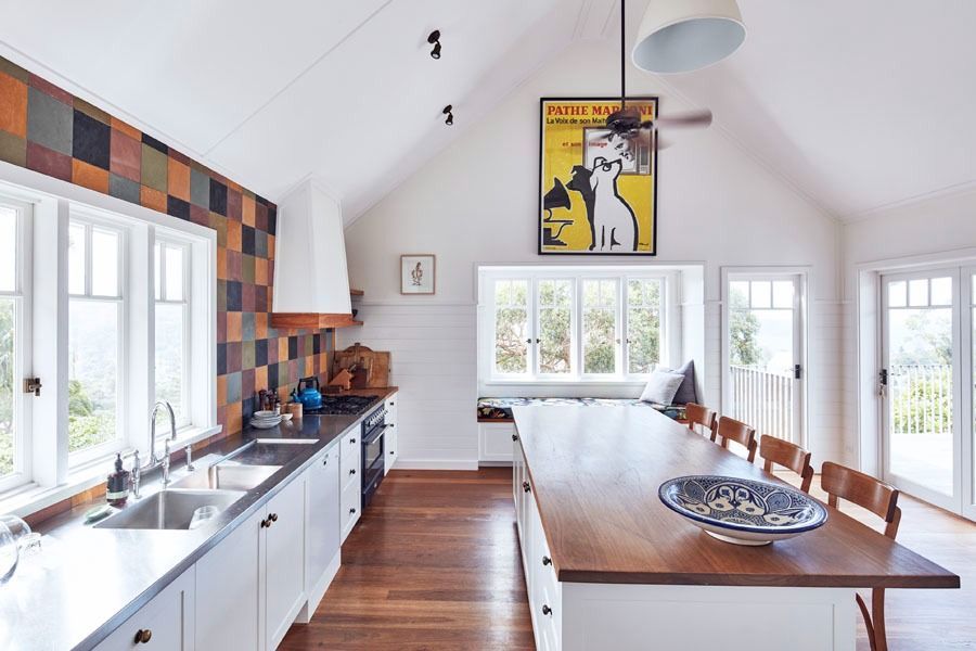Bright Modern Kitchen with White Cabinets and Large Windows — Fineworx Joinery in Warnervale, NSW