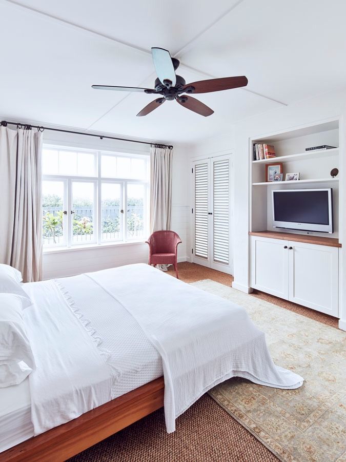Bright Bedroom with White Bed and Windows — Fineworx Joinery in Warnervale, NSW