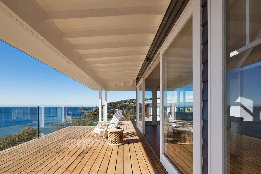 Wide Wooden Deck with Glass Sliding Doors, and Outdoor Chairs — Fineworx Joinery in Warnervale, NSW