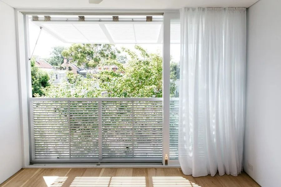 Bright Empty Room with Large Sliding Glass Doors — Fineworx Joinery in Warnervale, NSW