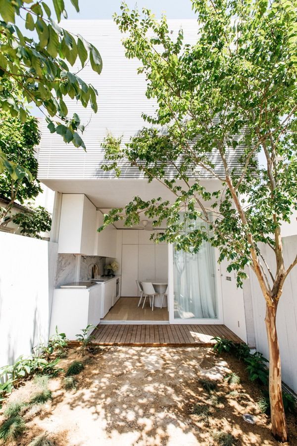 Small White Patio with Potted Greenery — Fineworx Joinery in Warnervale, NSW