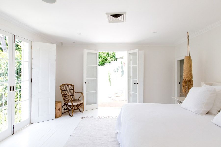 Bright White Bedroom with Open French Doors — Fineworx Joinery in Warnervale, NSW