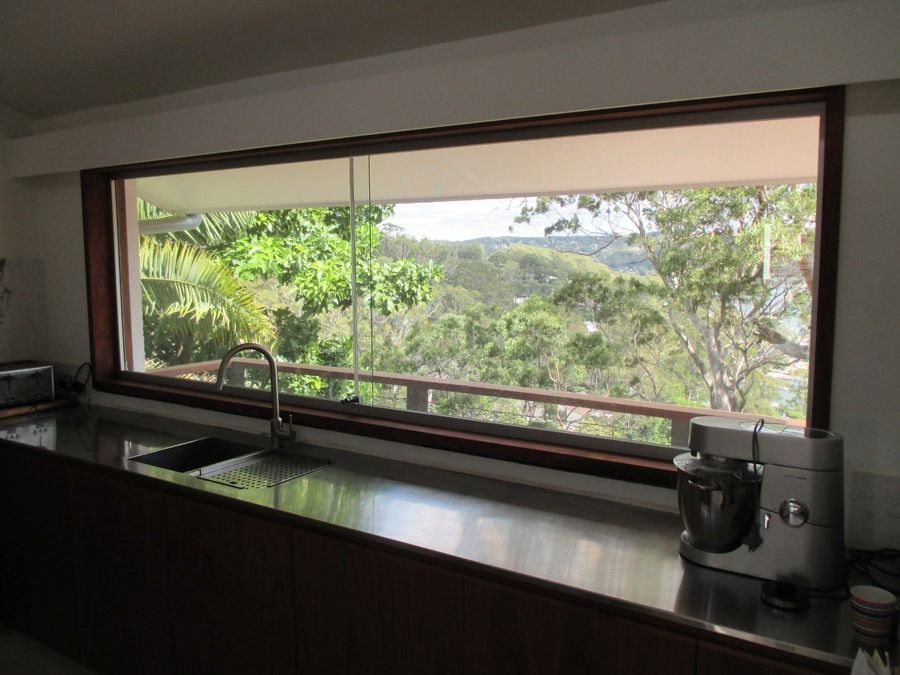 Kitchen Window Overlooking Lush Green Trees and Hills — Fineworx Joinery in Warnervale, NSW