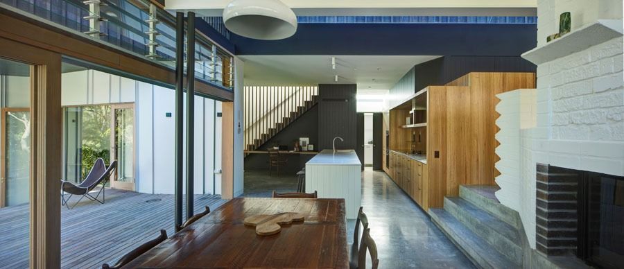 Modern Open-Plan Living Room with Wood Paneling and Sliding Glass Doors — Fineworx Joinery in Nambucca Heads, NSW