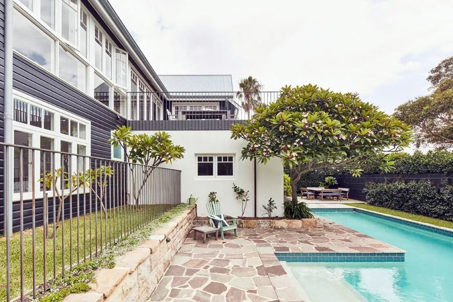 Modern House Courtyard with Swimming Pool and Stone Patio — Fineworx Joinery in Warnervale, NSW