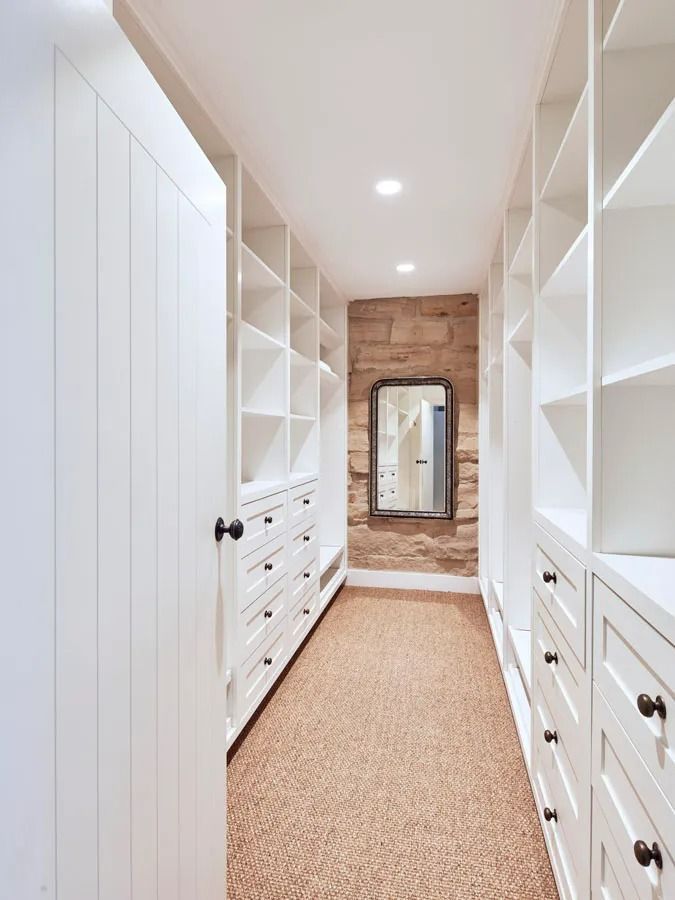 Narrow White Walk In Closet with Drawers and A Window at The Far End — Fineworx Joinery in Warnervale, NSW
