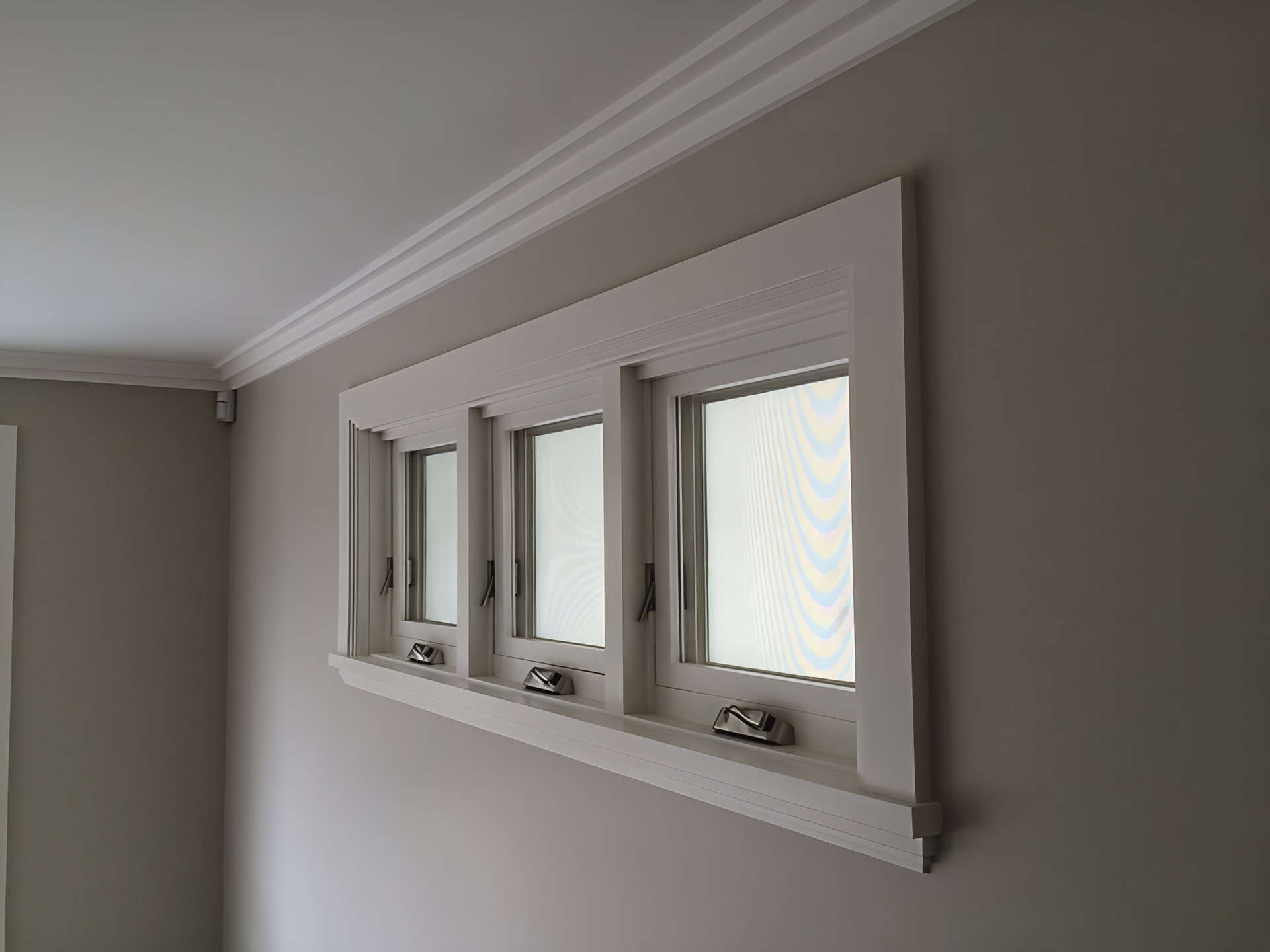 White Framed Interior Windows Along a Grey Wall and Ceiling in A Room — Fineworx Joinery in Warnervale, NSW
