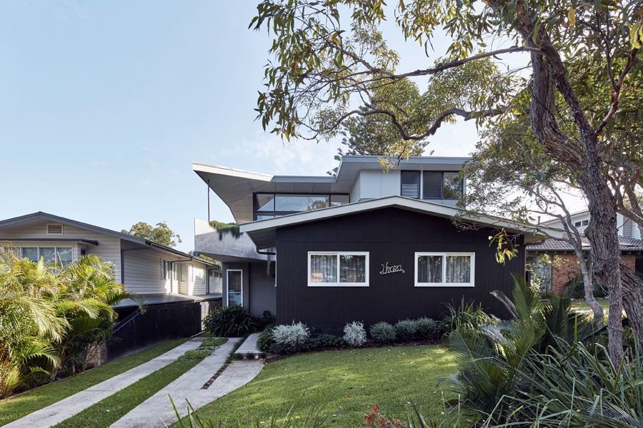 Modern Dark House with A Sloped Driveway — Fineworx Joinery in Warnervale, NSW