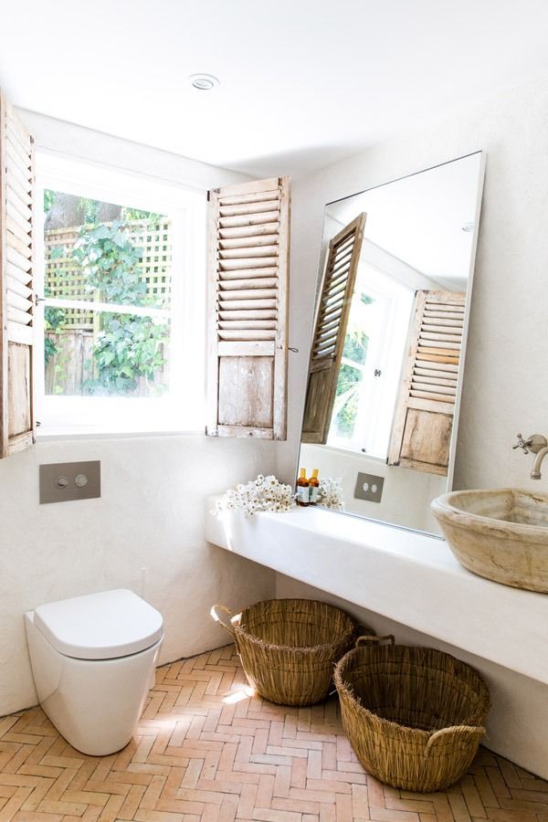 Bright Bathroom with White Walls and A Toilet Beside an Open Window — Fineworx Joinery in Warnervale, NSW