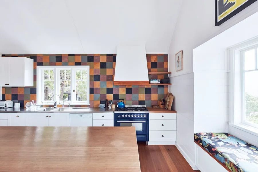 Bright Modern Kitchen with Colorful Tile Backsplash and Large Window Seat — Fineworx Joinery in Warnervale, NSW