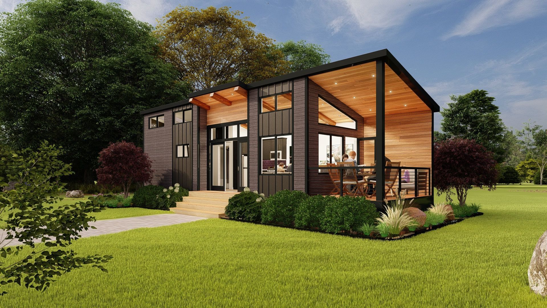 A small newly built house with a porch surrounded by a fence.