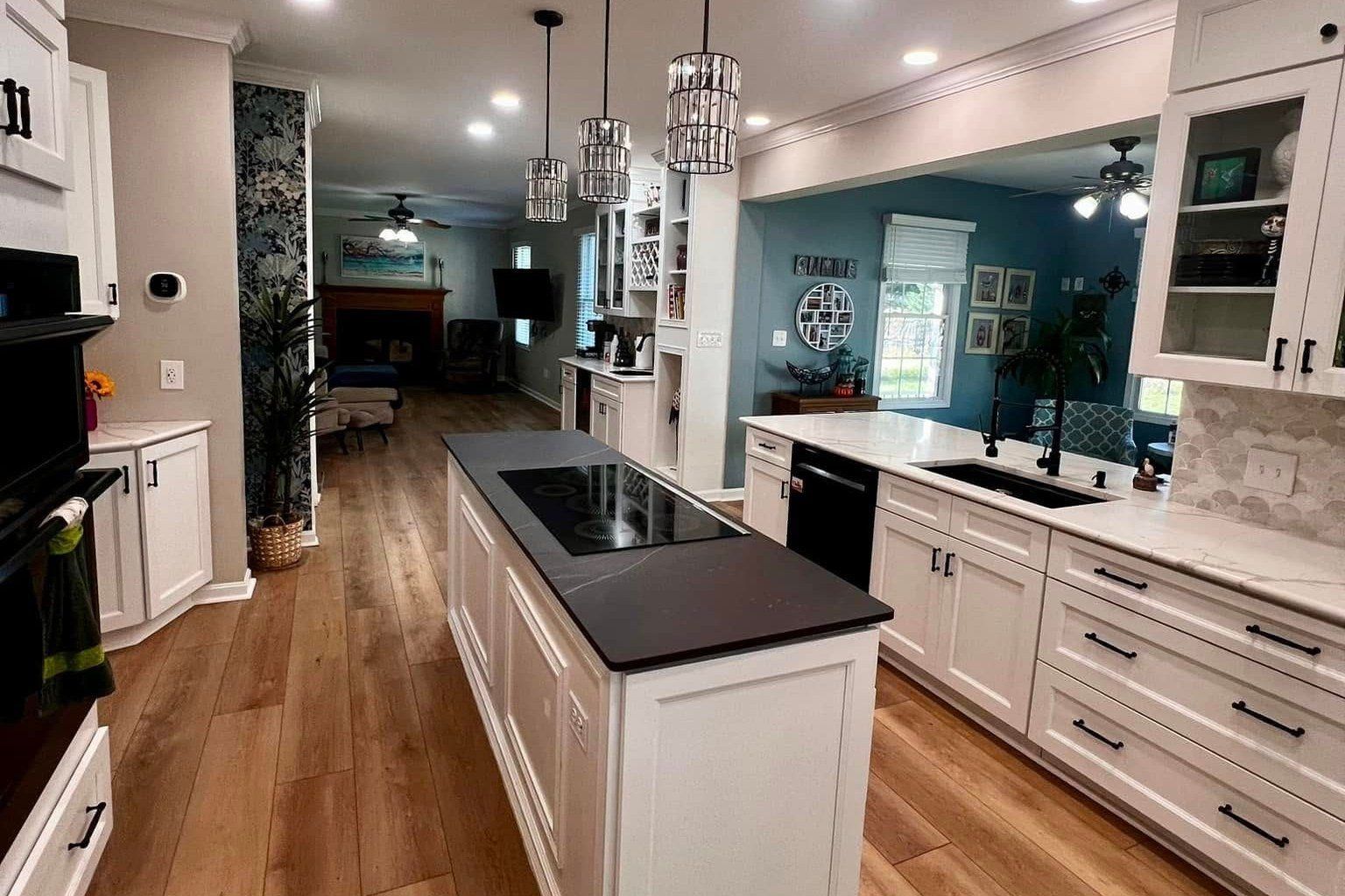 A finished kitchen island and cabinetry run