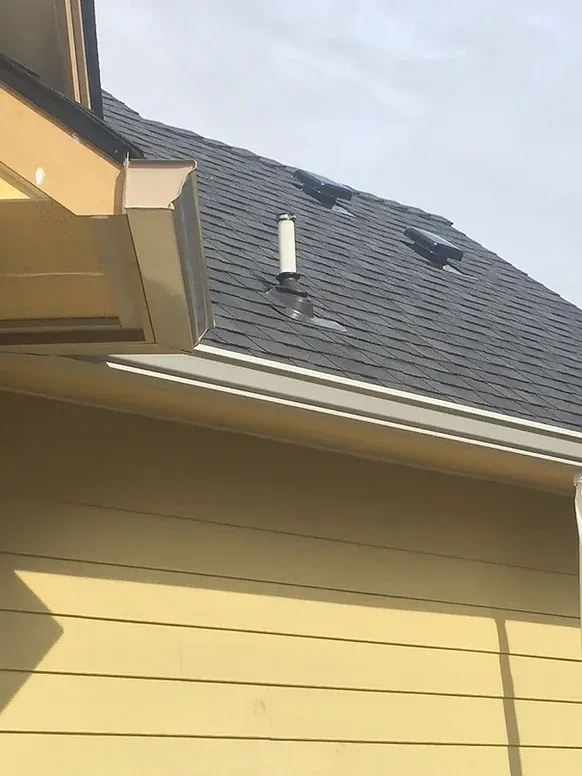 A close up of a roof with shingles on it.