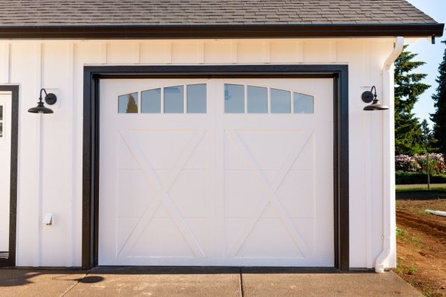 Close-up view of residential garage doors installed by professionals.