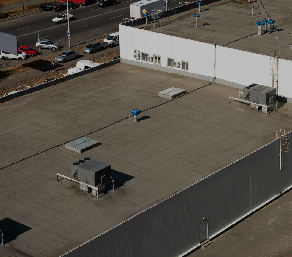 An aerial view of the roof of a building with the word ball on it