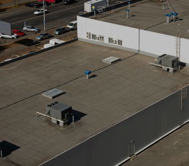 An aerial view of the roof of a building with the word ball on it