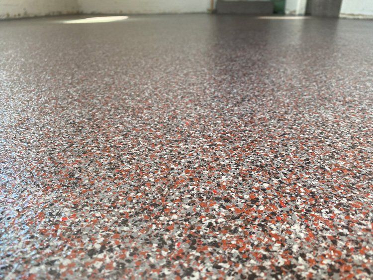 Man Doing Epoxy Coating — Salem, OR — Elite Surface Coatings