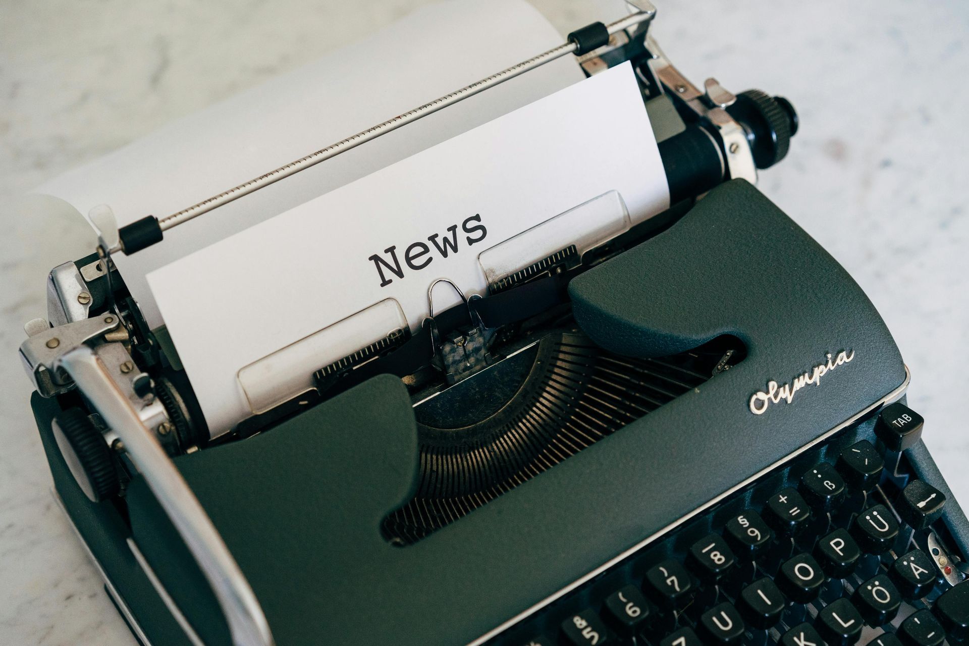 Dark green Olympia typewriter with