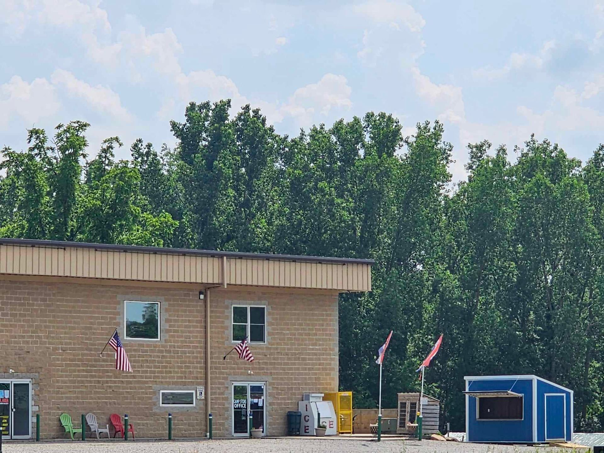 a brick building with a sign that says ' open ' on it