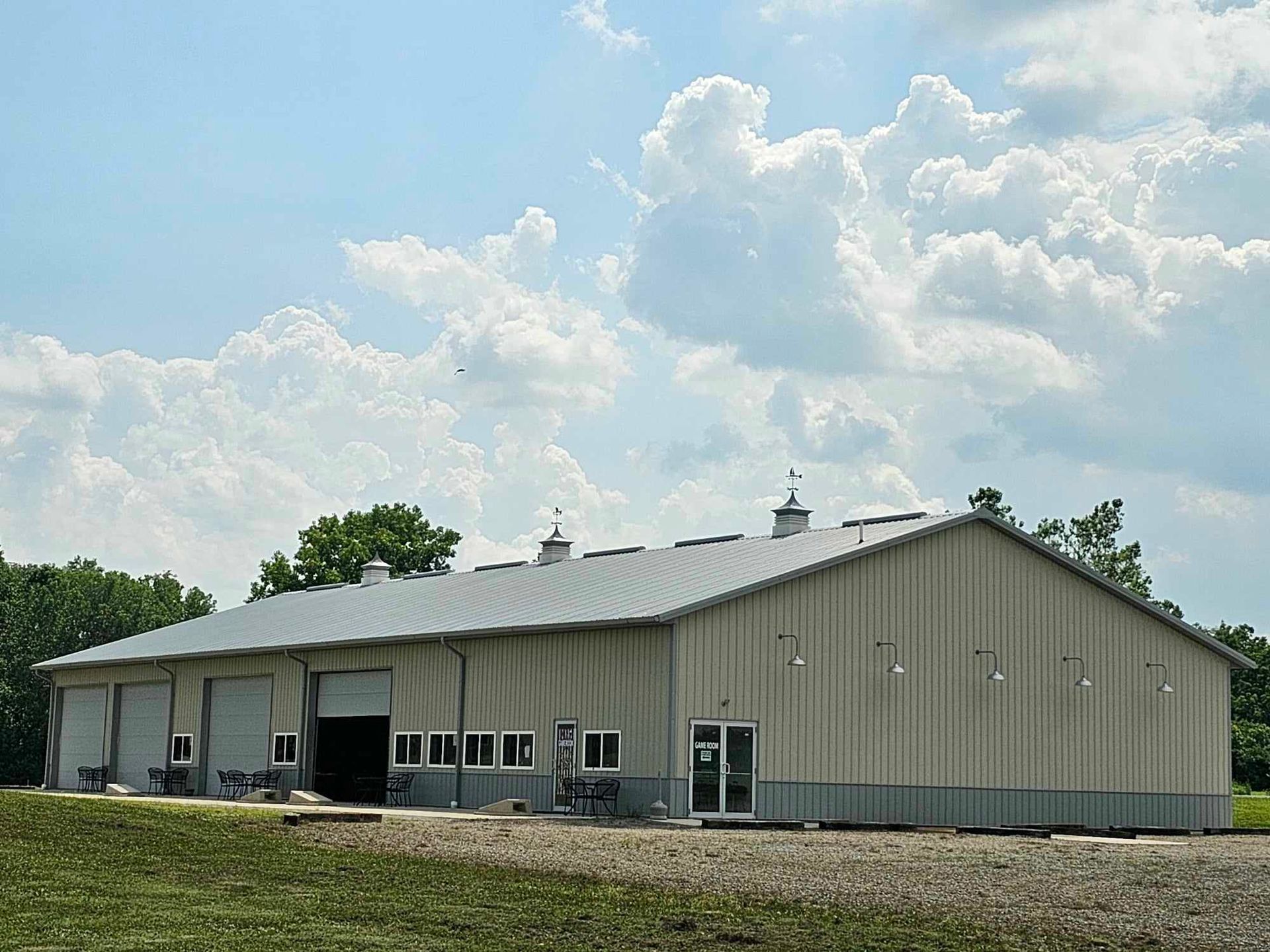 a large building with a lot of windows and doors