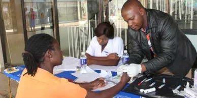 image of 3 people sitting at a table
